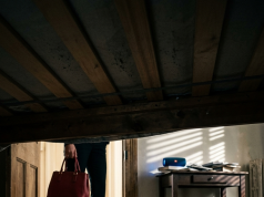 My neighbor swore a woman was crying inside my house every day while I was at work—so I hid inside to catch the intruder, but what I heard from her speaker changed everything I thought I knew